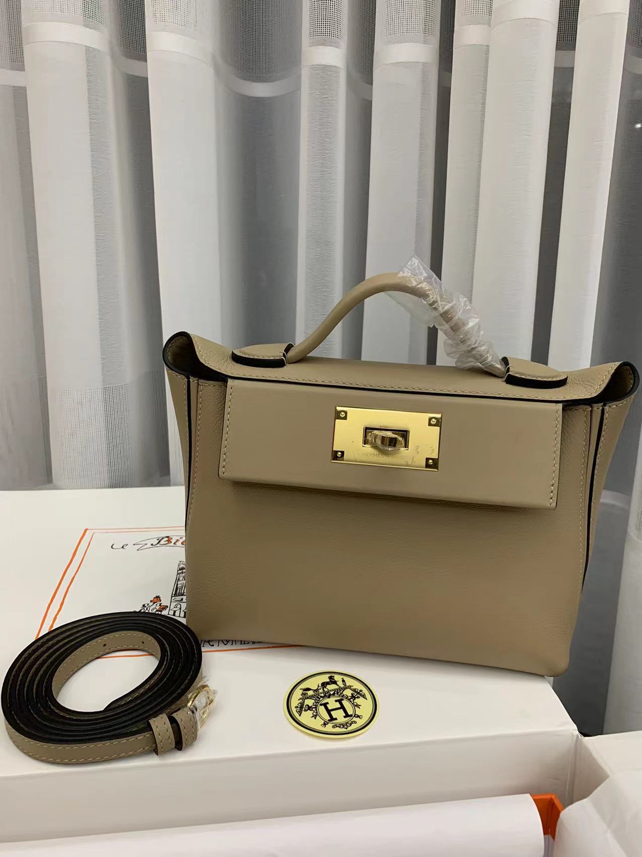 Hermes Kelly Mini 2424 21cm Handbag in Trench Clemence Leather